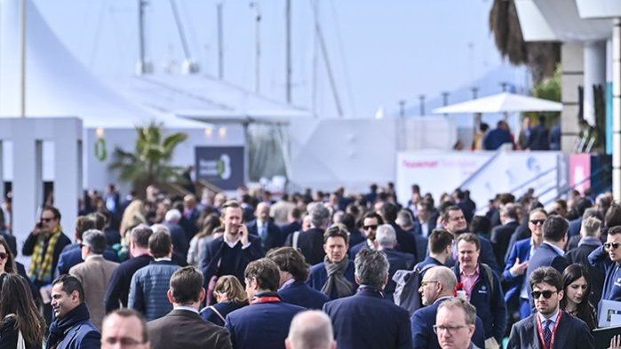 Delegates by the Cannes marina during a congress